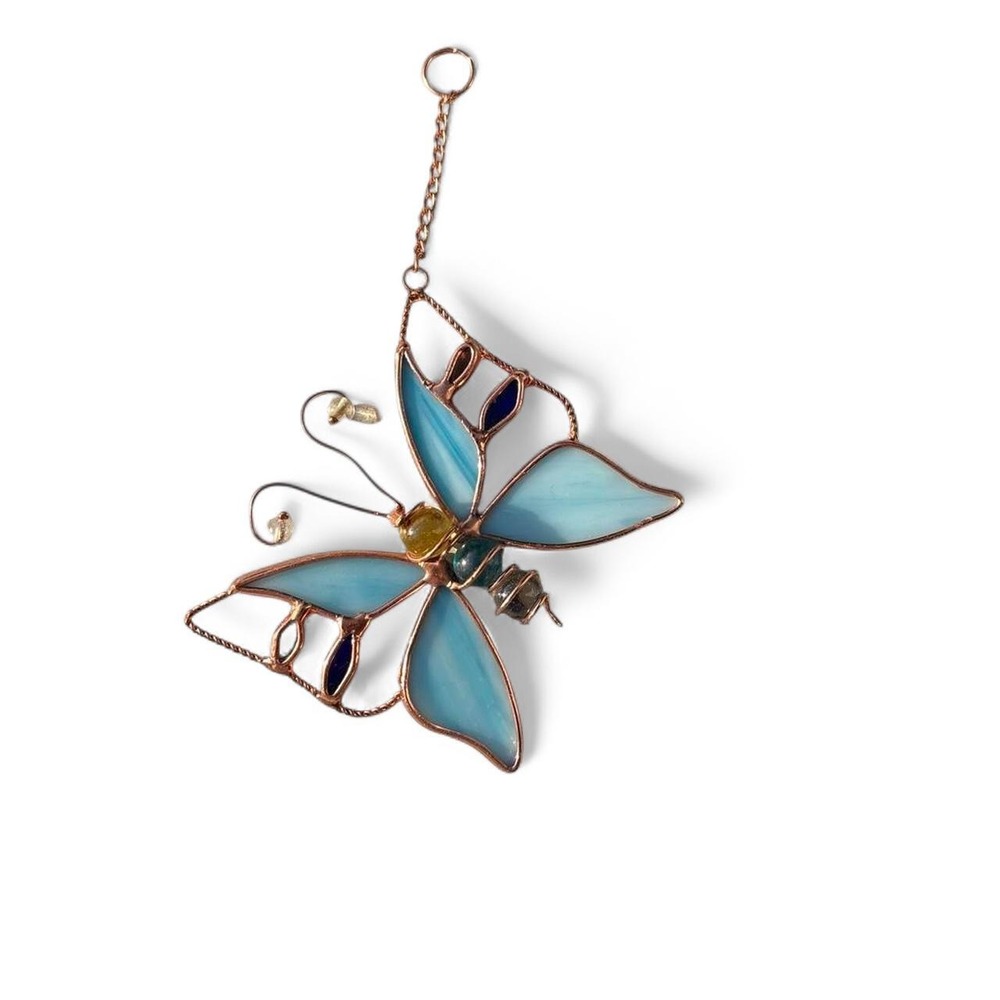 Blue stained glass butterfly suncatcher with copper wire frame and glass orbs